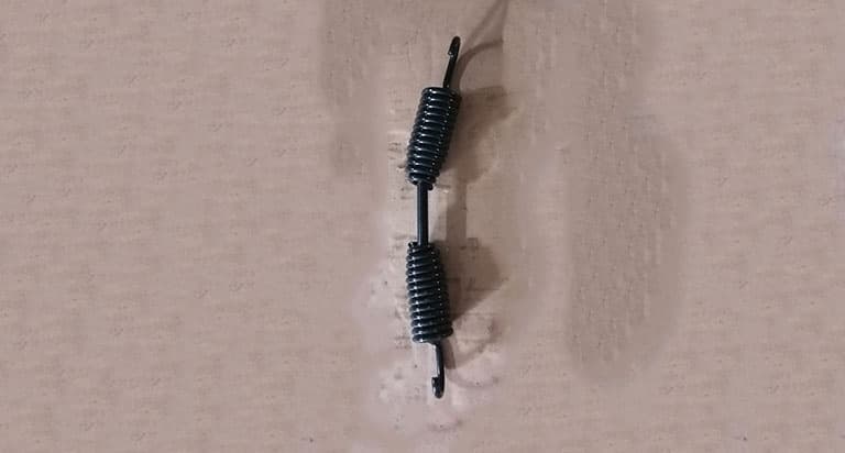 Return spring