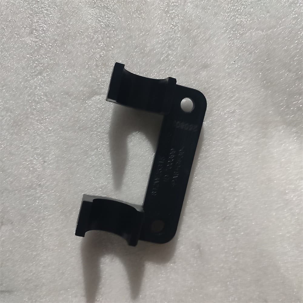 Front combination light pressing plate