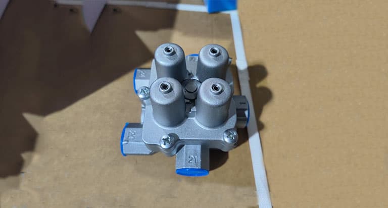 Four-circuit protection valve