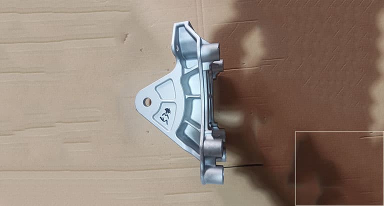Cab front suspension transition bracket