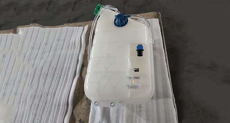 Expansion tank assembly