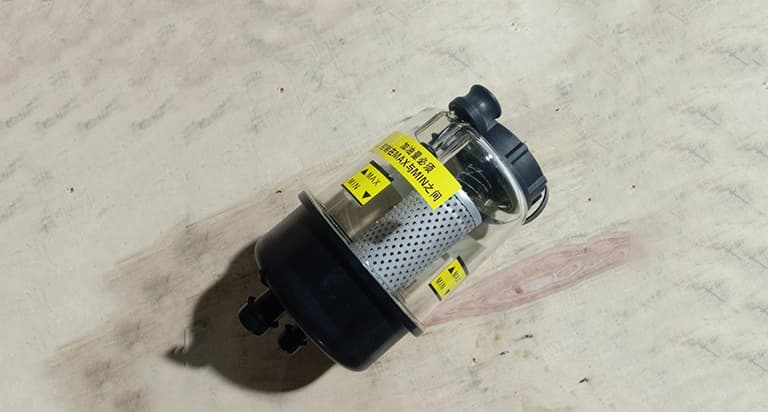 Steering fluid reservoir