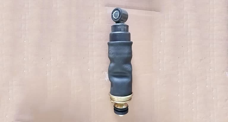 Front shock absorber assembly