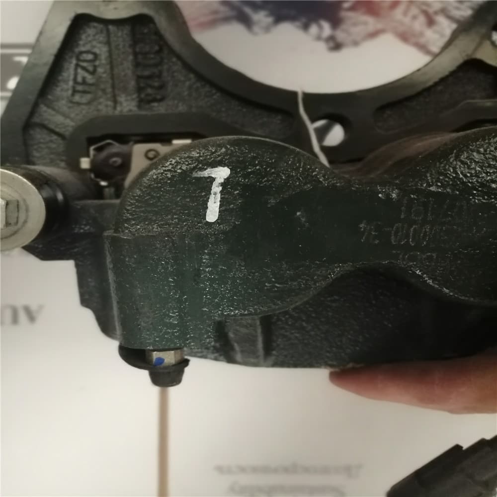 Суппорт тормозной левый Фотон-1049C.