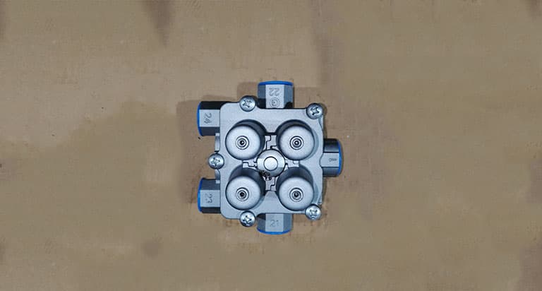 Four circuit protective valve