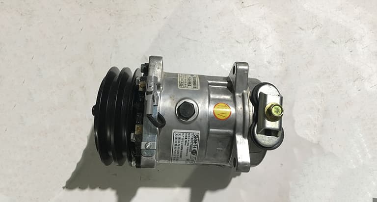 Air conditioning compressor