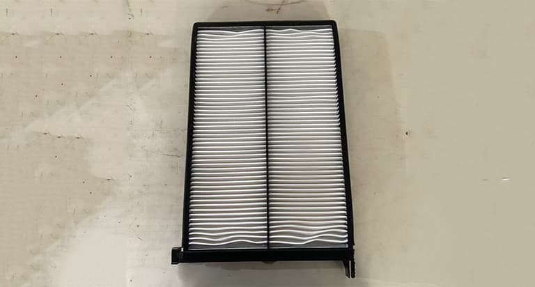 Air conditioning filter element