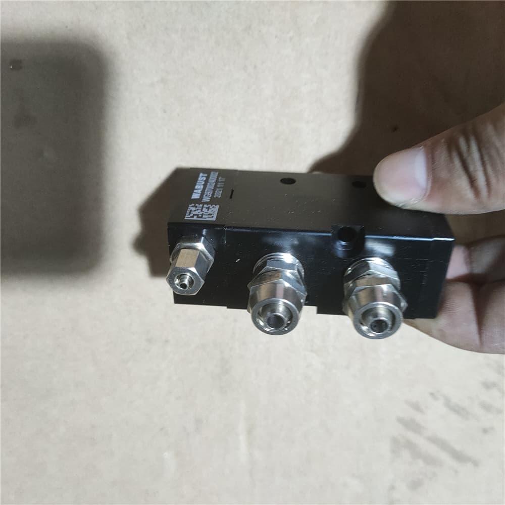 Two position five way solenoid valve